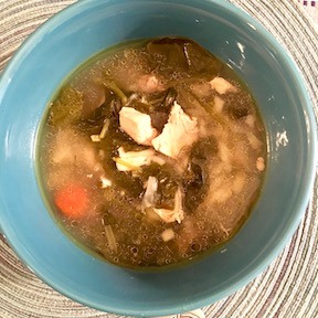 Chicken soup made with orzo and spinach